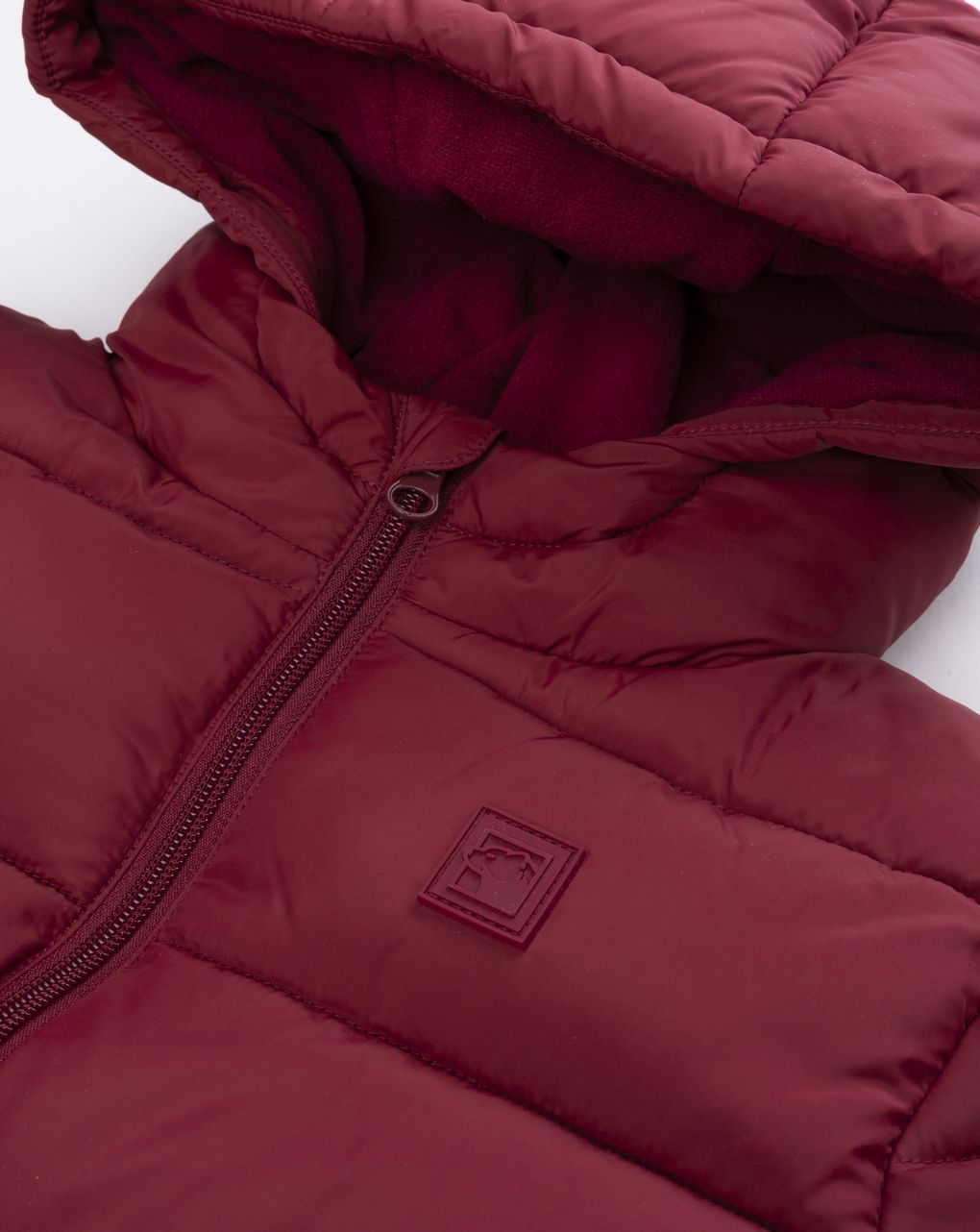 Piumino con cappuccio imbottito bordeaux bambino