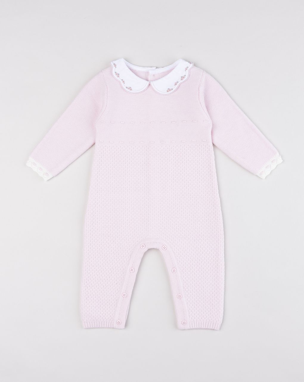 Pagliaccetto neonata in maglia rosa con colletto ricamato a fiori