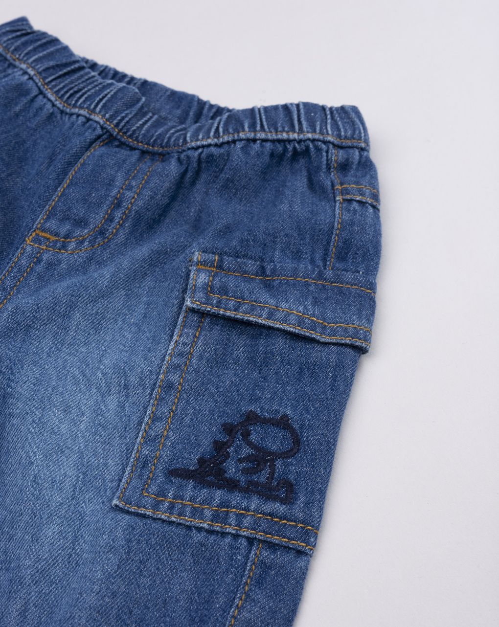 Pantalone denim neonato con ricamo dinosauro