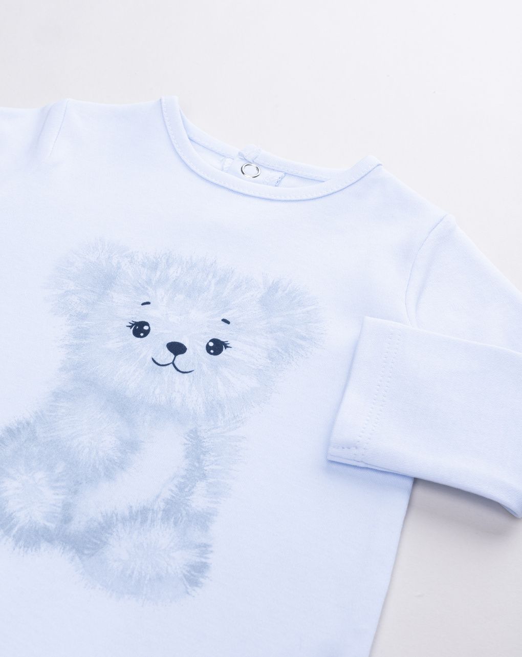 Tutina neonato in cotone azzurro chiaro con stampa orsetto