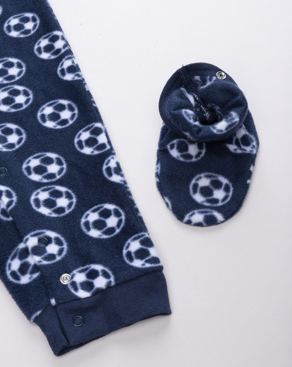 Pigiamone bimbo blu notte in pile con fantasia stellata all-over