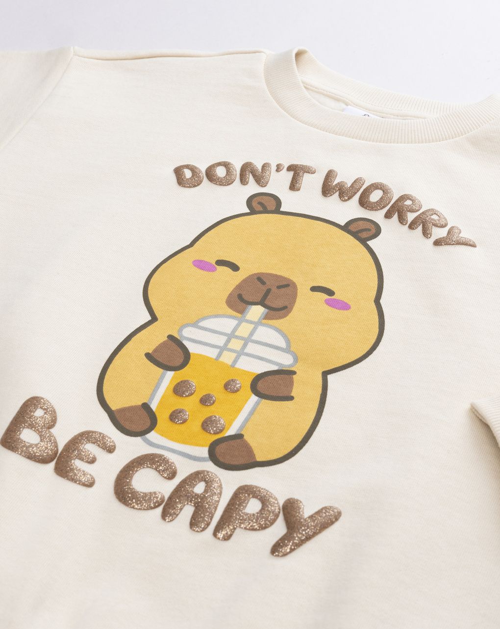 Felpa girocollo bambina capibara "don't worry be capy" panna