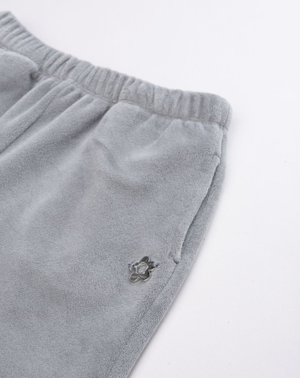 Pantaloni in ciniglia da bimba grigio con margherita