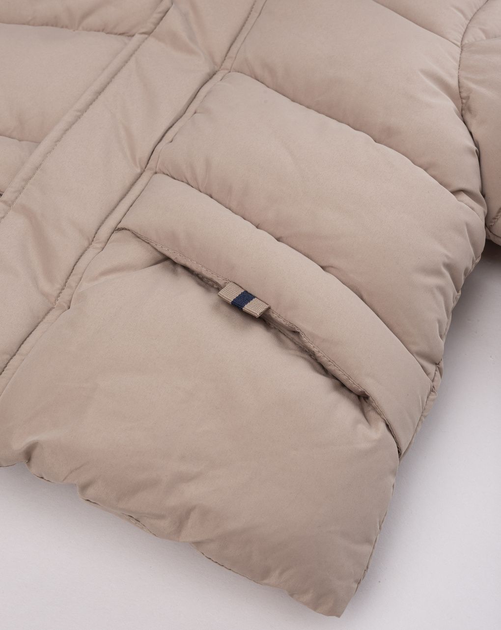 Giubbotto imbottito bimbo beige con cappuccio in finta pelliccia