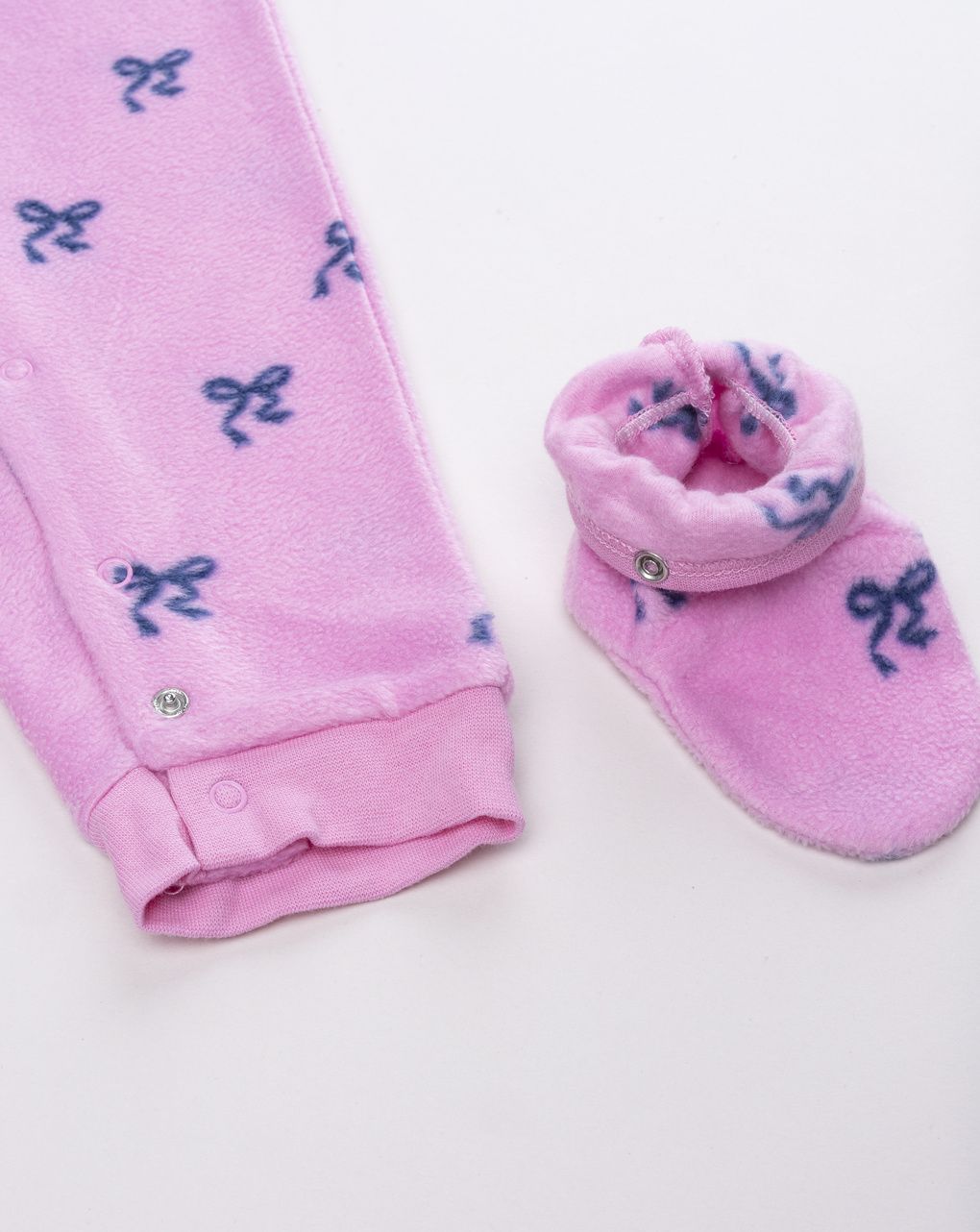 Pigiama intero fiocchi rosa bimba