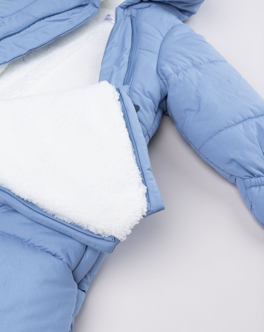 Sacco neve da neonato azzurro invernale con cappuccio