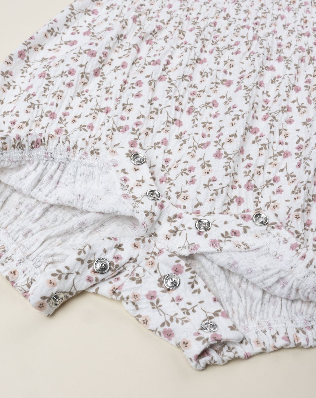 Pagliaccetto bimba beige fiorellini allover