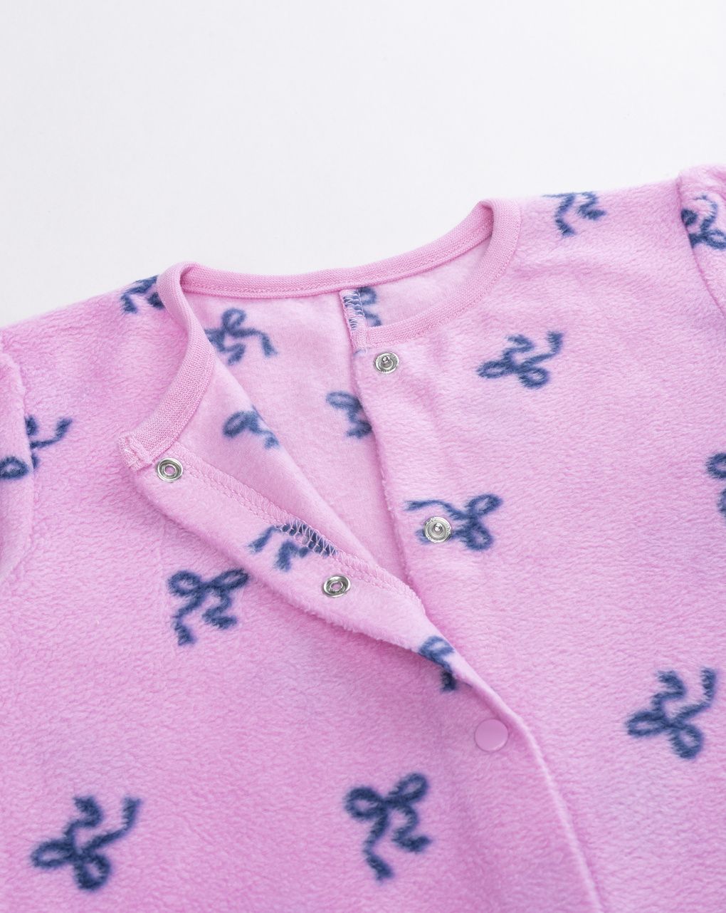 Pigiama intero fiocchi rosa bimba