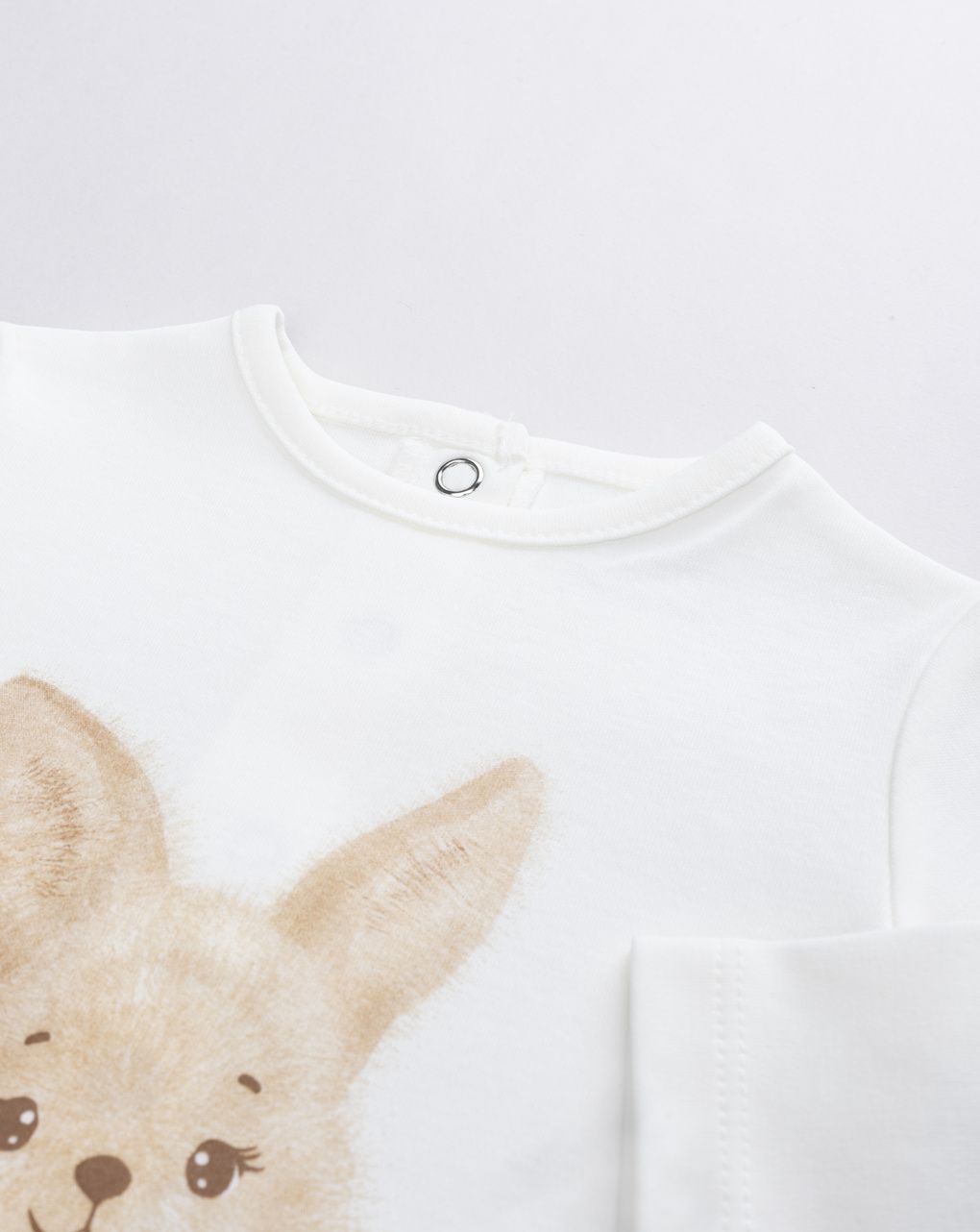 Tutina neonato in cotone bianco con stampa coniglietto beige