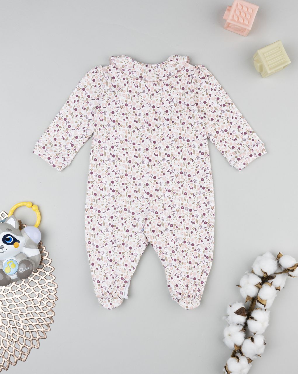 Tutina bimba neonata con piedini a fantasia allover
