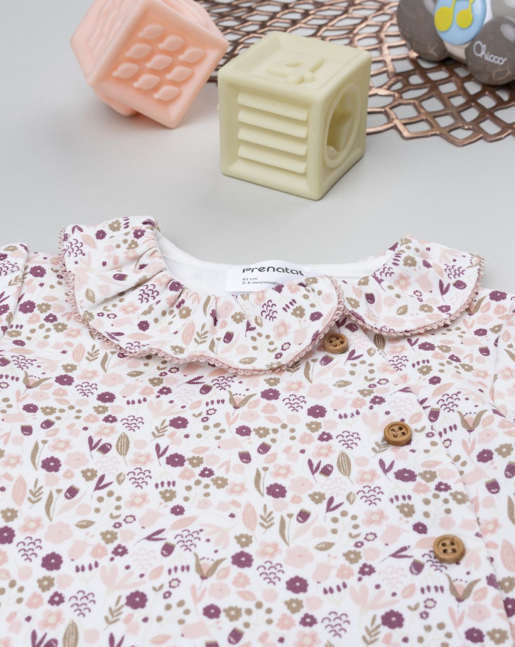 Tutina bimba neonata con piedini a fantasia allover