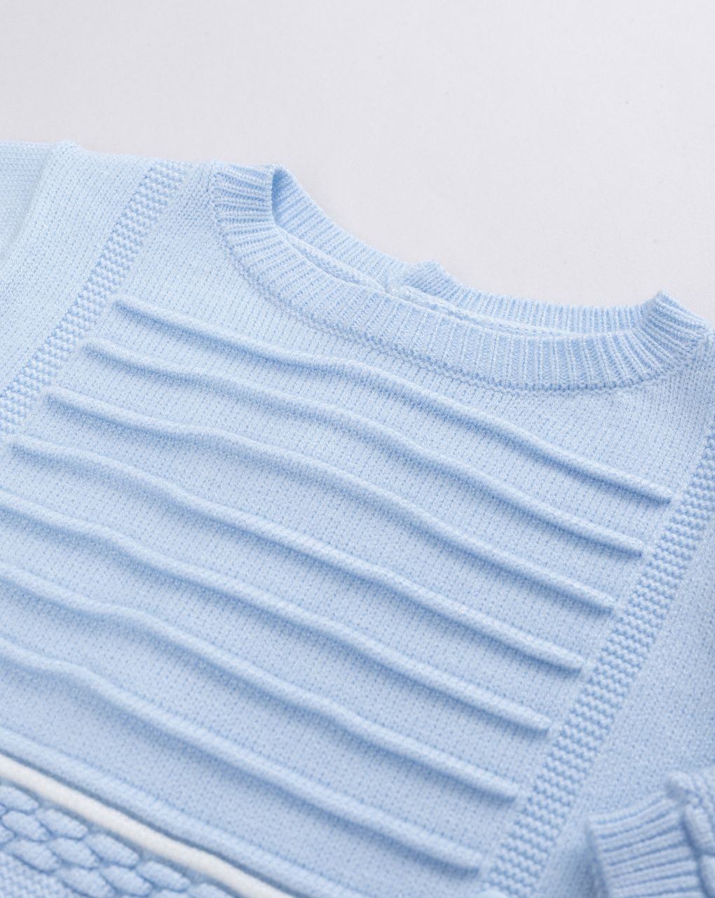 Tutina tricot da neonato celeste in maglieria morbida