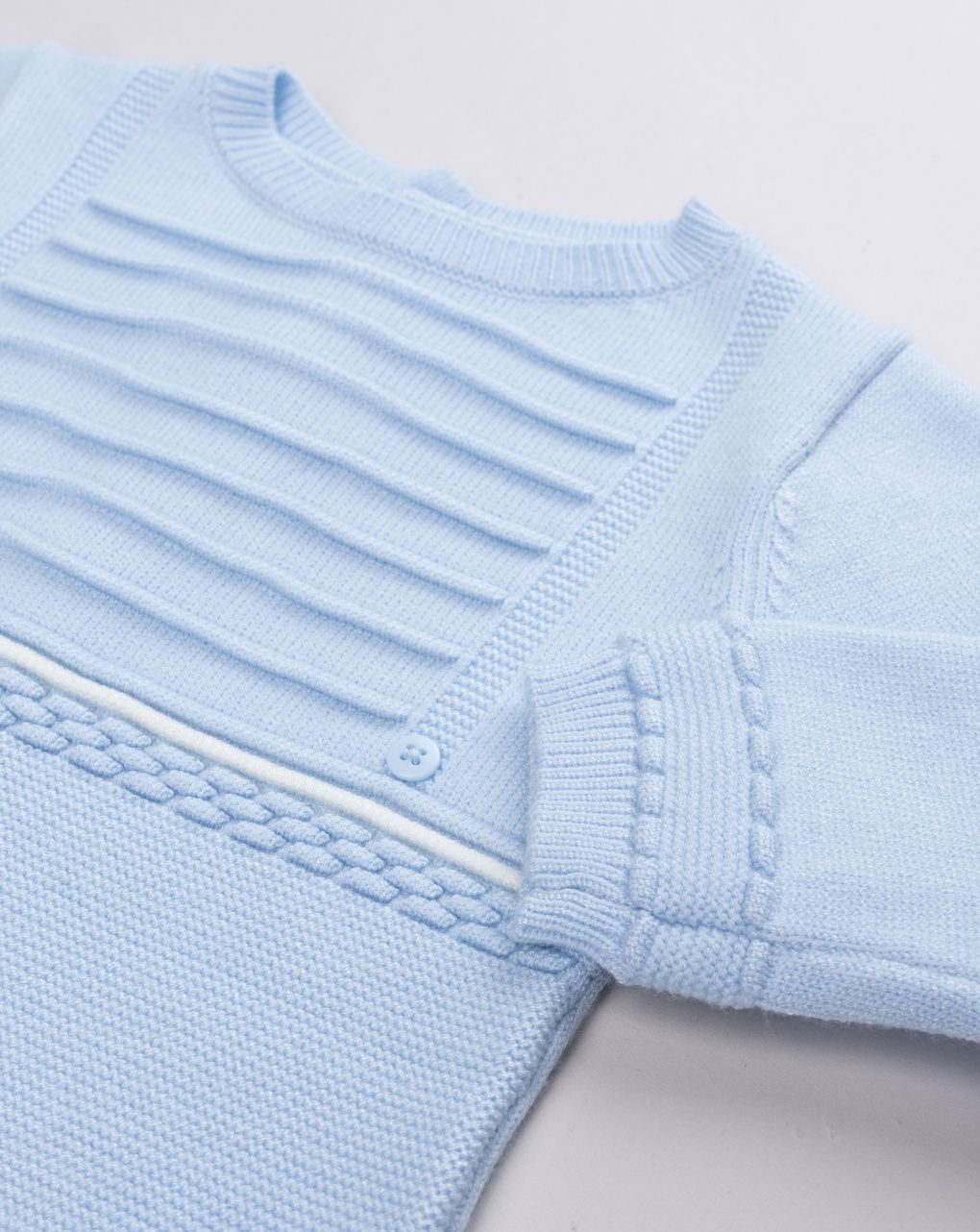 Tutina tricot da neonato celeste in maglieria morbida