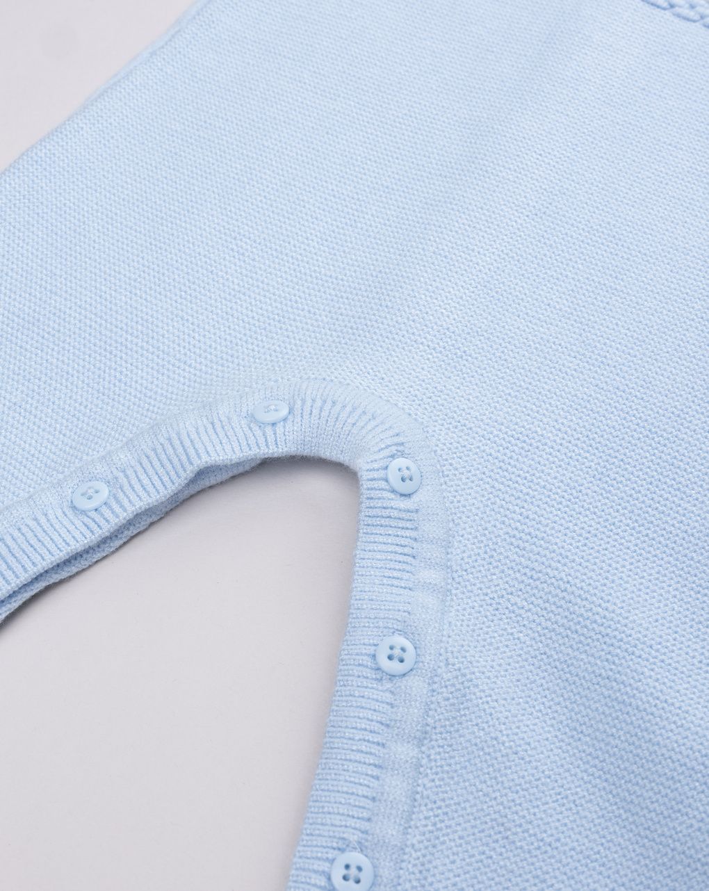 Tutina tricot da neonato celeste in maglieria morbida