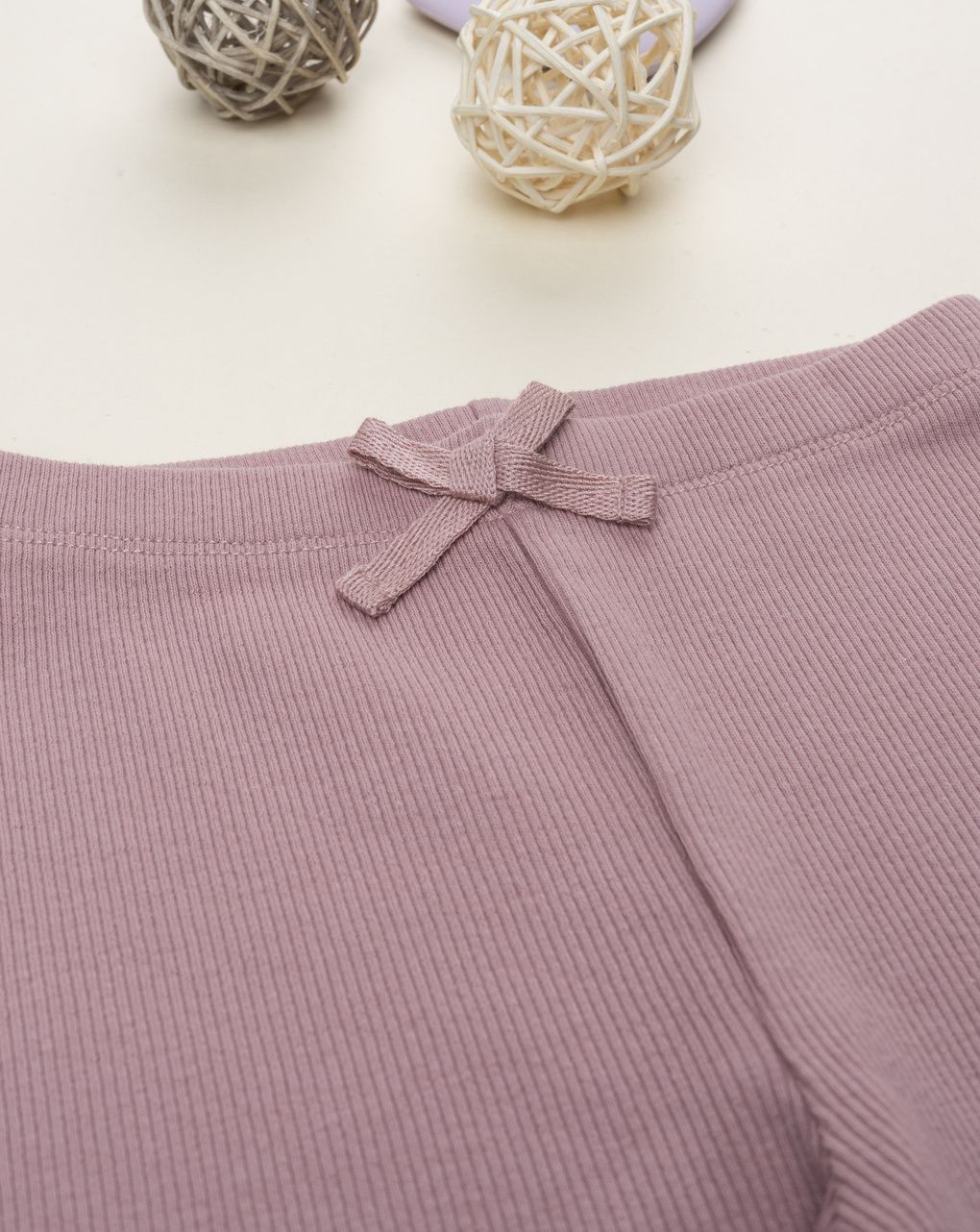 Leggings bimba total rosa antico con fiocco