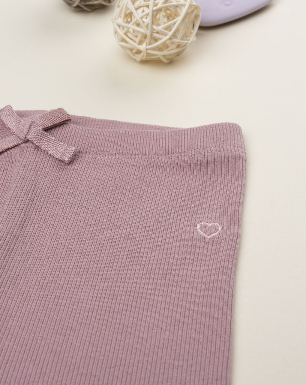 Leggings bimba total rosa antico con fiocco