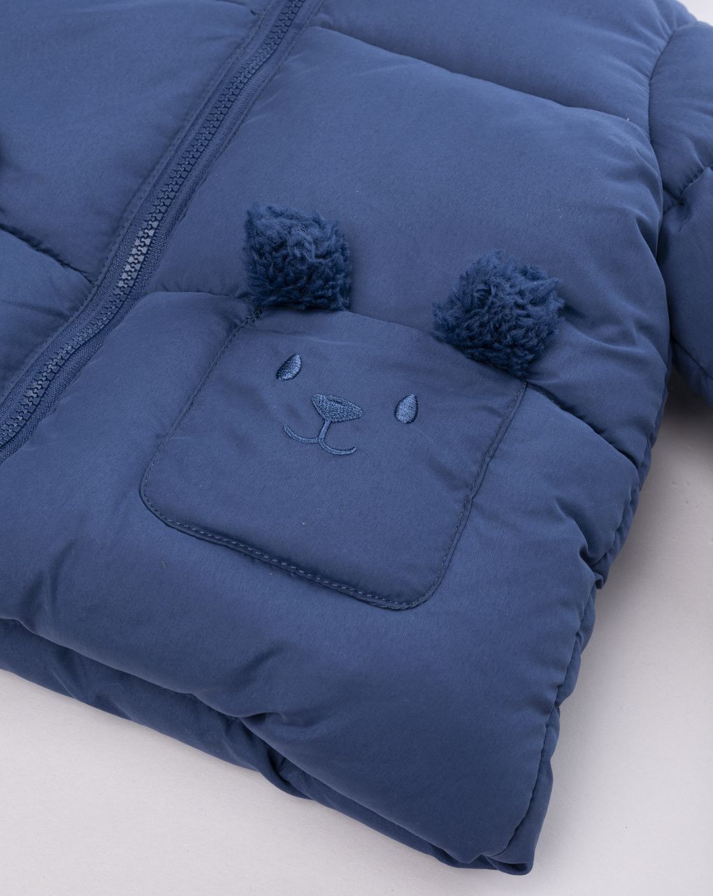 Giubotto neonato blu con cappuccio e tasche