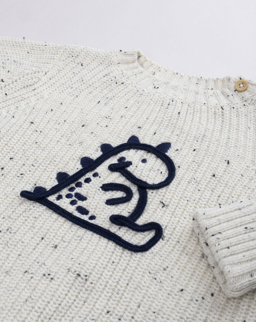 Maglia tricot neonato con dinosauro