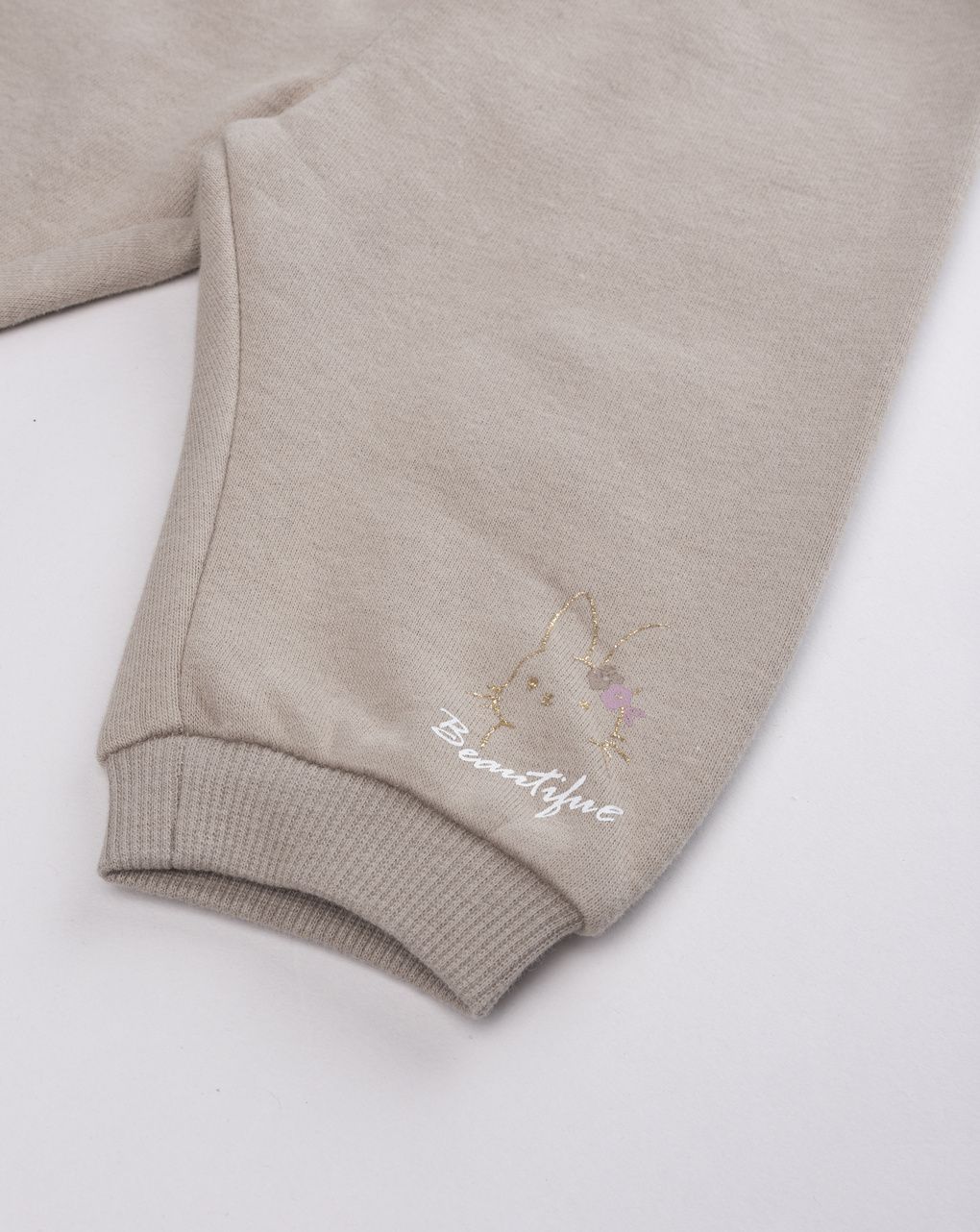 Pantalone felpato neonata beige con scritta "beautiful"