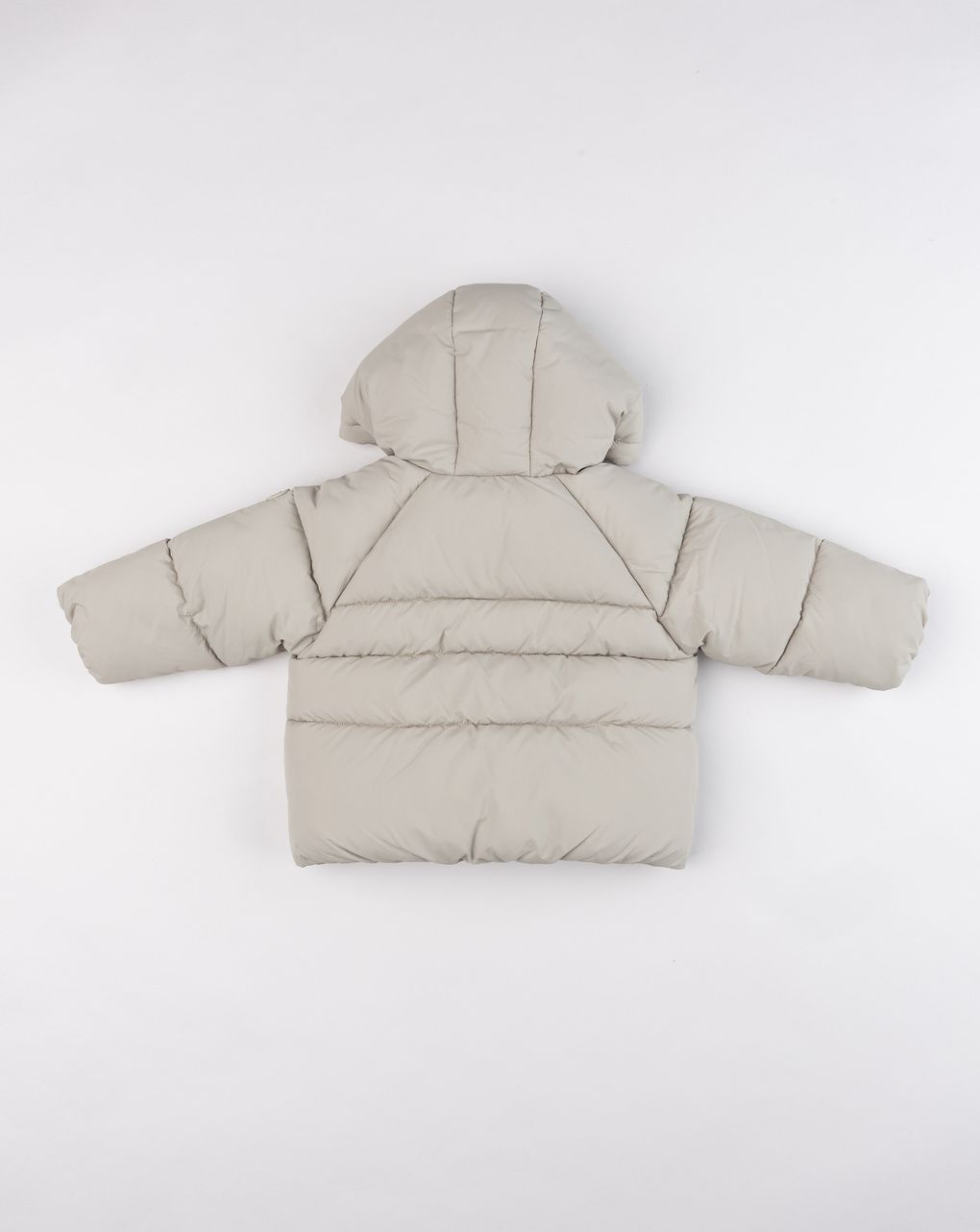 Piumino con cappuccio a orecchie beige bimbo